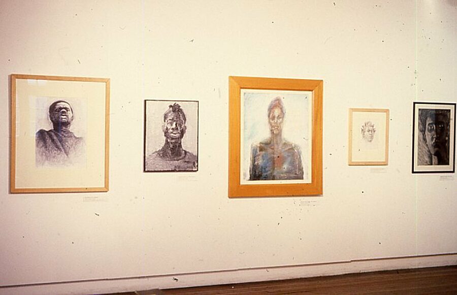 Let The Canvas Come To Life With Dark Faces (1990). The second painting is Lyndon Volney's 'Self Portrait' and displayed to the right is Georgia Belfont's 'Untitled'.
