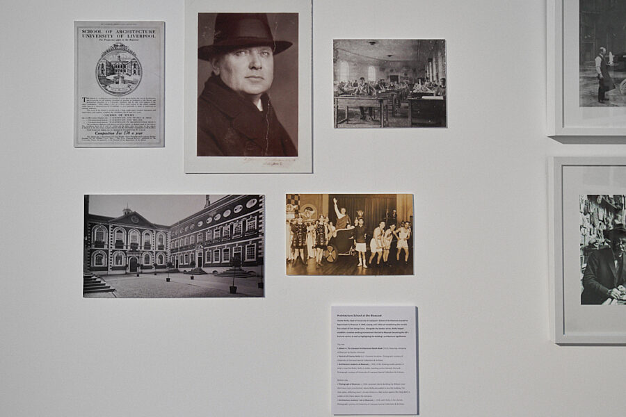 A photo of some archival material on a wall, including an exterior image of the Bluecoat.