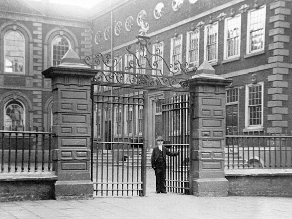 School boy at front gates