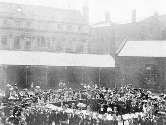 Gathering in rear courtyard