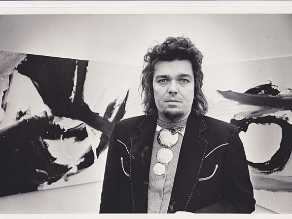 Captain Beefheart in the Bluecoat gallery in front of his paintings