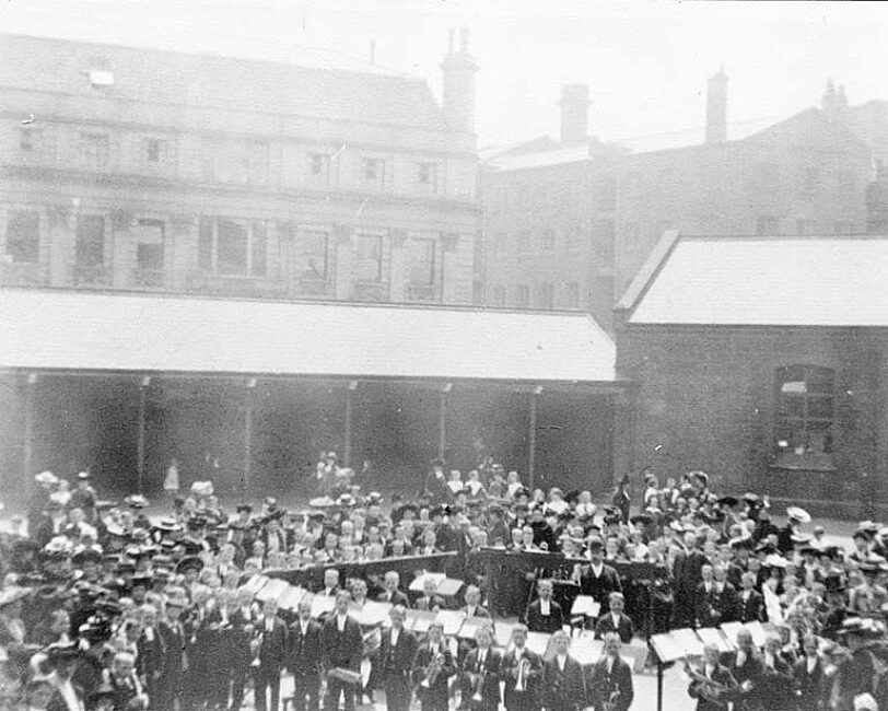 Gathering in rear courtyard